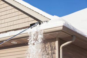 Remove Snow and Debris - Coastal Roof Experts, MA